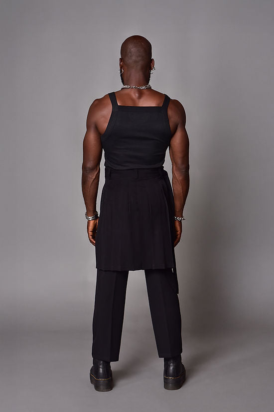 Loose pants with black pleated skirt