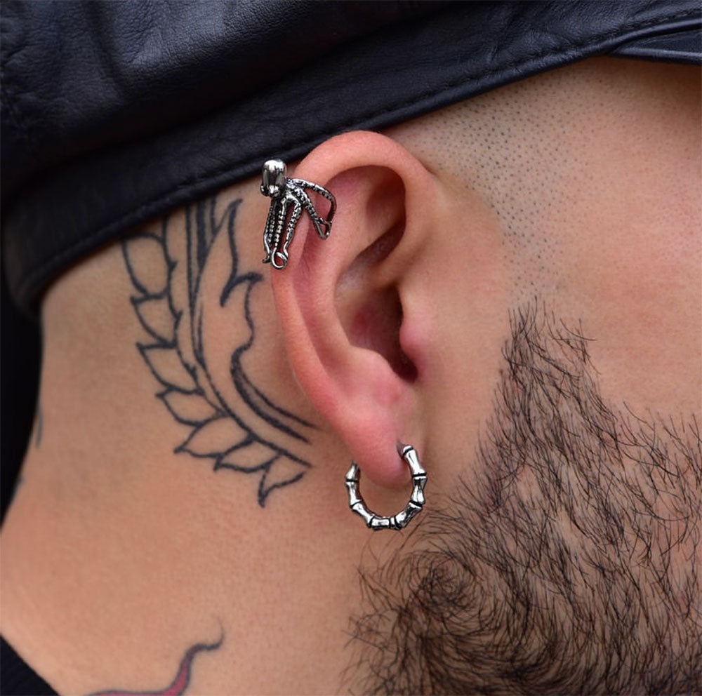 Bones silver earring